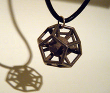 Load image into Gallery viewer, Dodecahedron with captured sphere