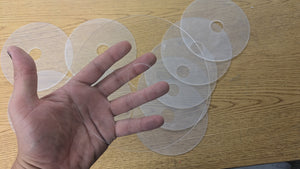 Tap protector discs for arcade buttons